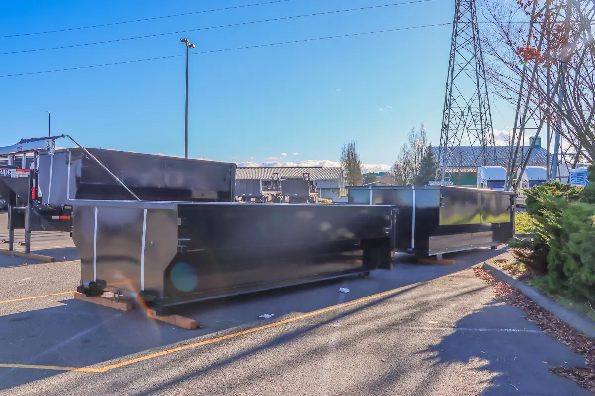 Roll-off dumpster ready for waste disposal at job site for Commercial Dumpster Rental in Harrisville
